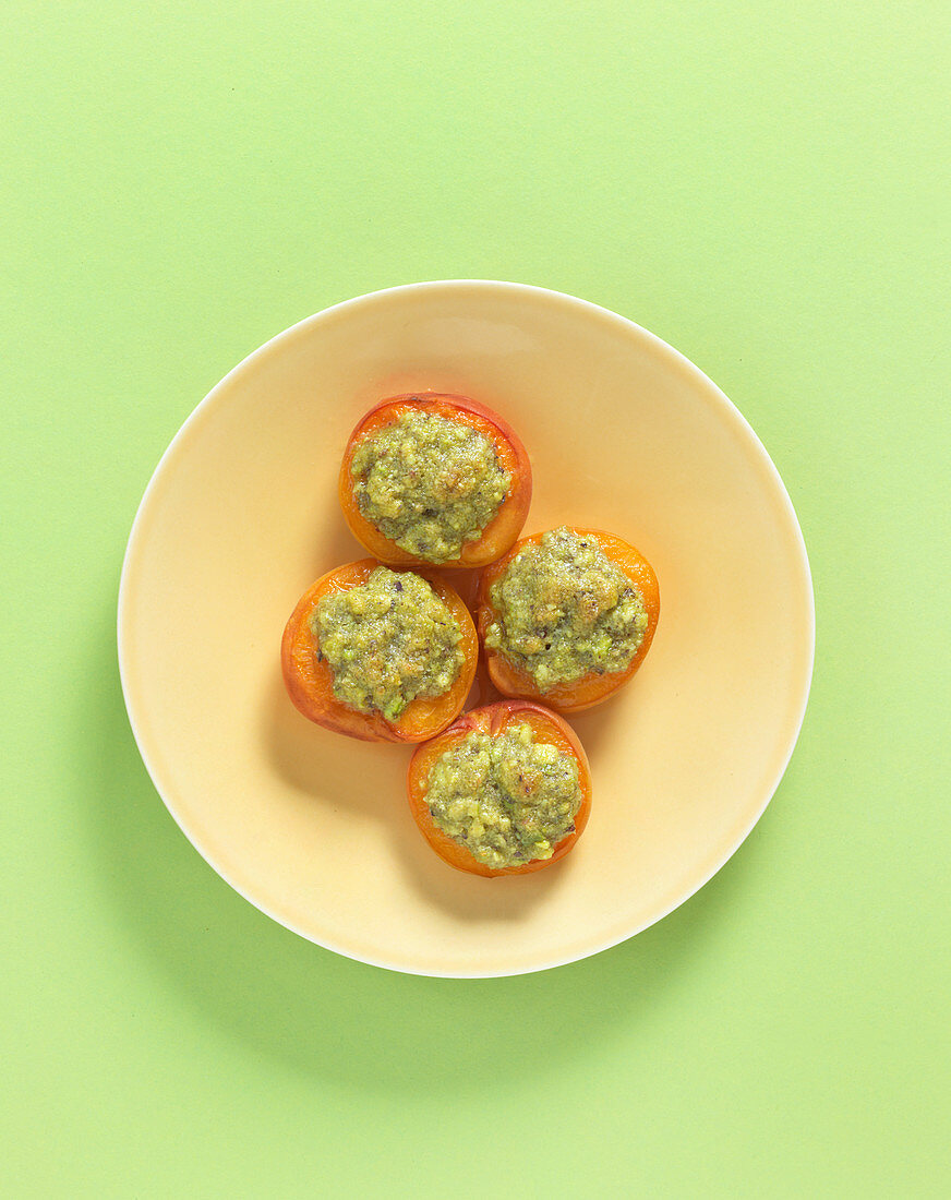 Oven-roasted, stuffed apricots with a pistachio nut crust