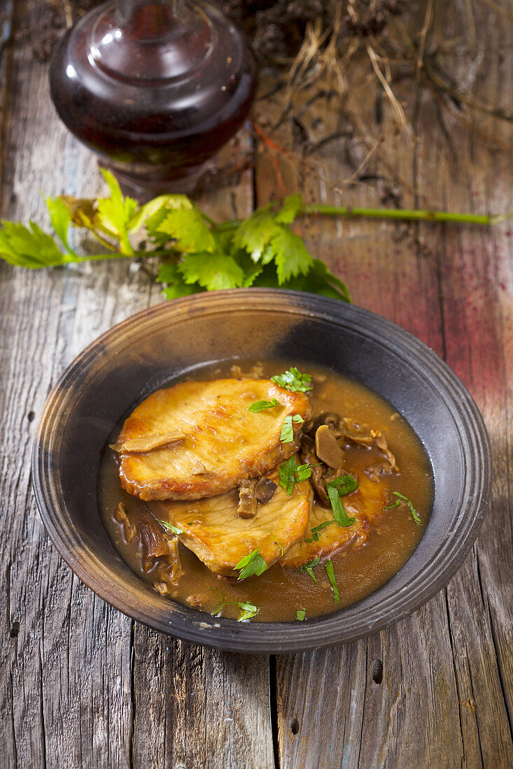 Pork chop in mushroom sauce