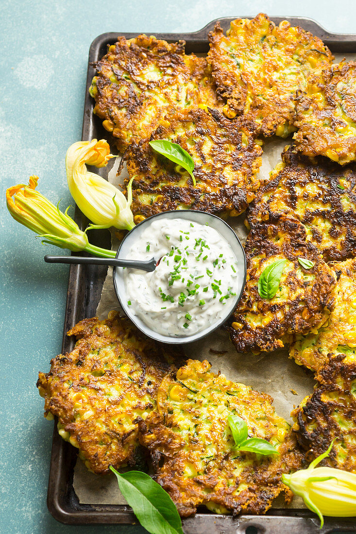 Courgette and sweetcorn fritters with herb cream cheese