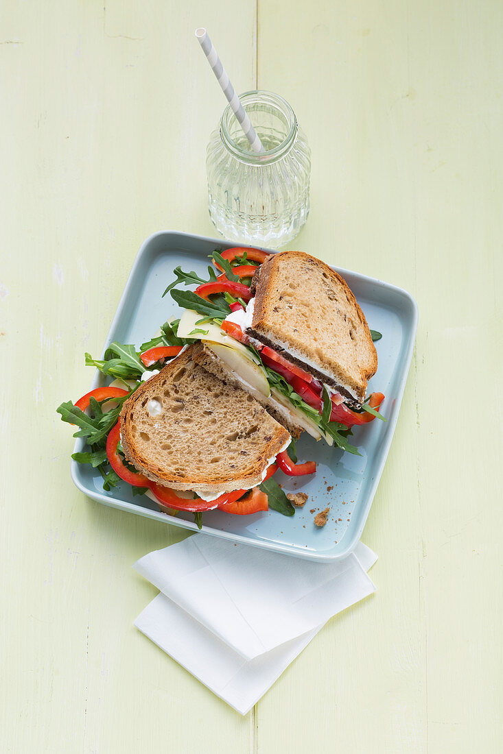 Double-decker cheese and pear sandwiches with peppers