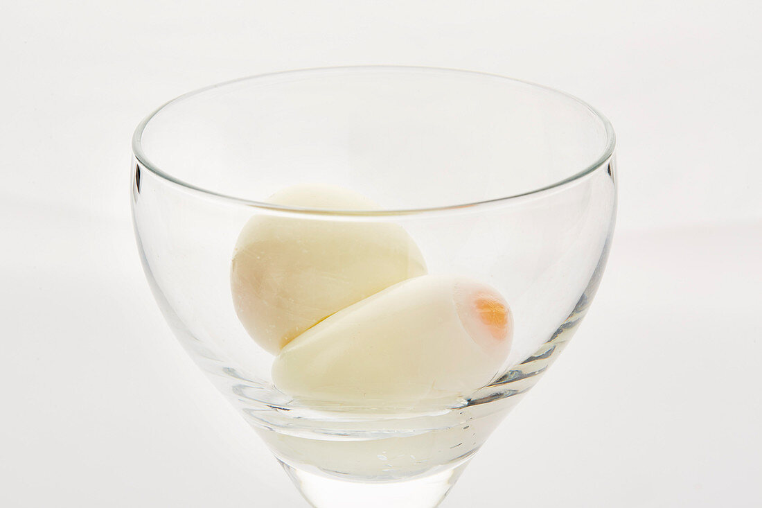 Weichgekochte Eier in einem Glas
