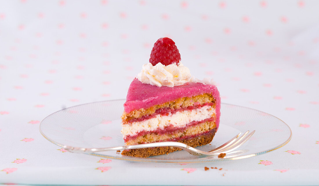 A slice of raspberry marzipan cake