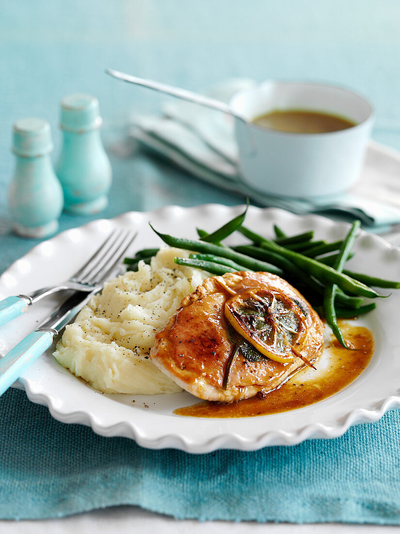 Roast turkey schnitzel with sage, lemon, mashed potatoes and green beans