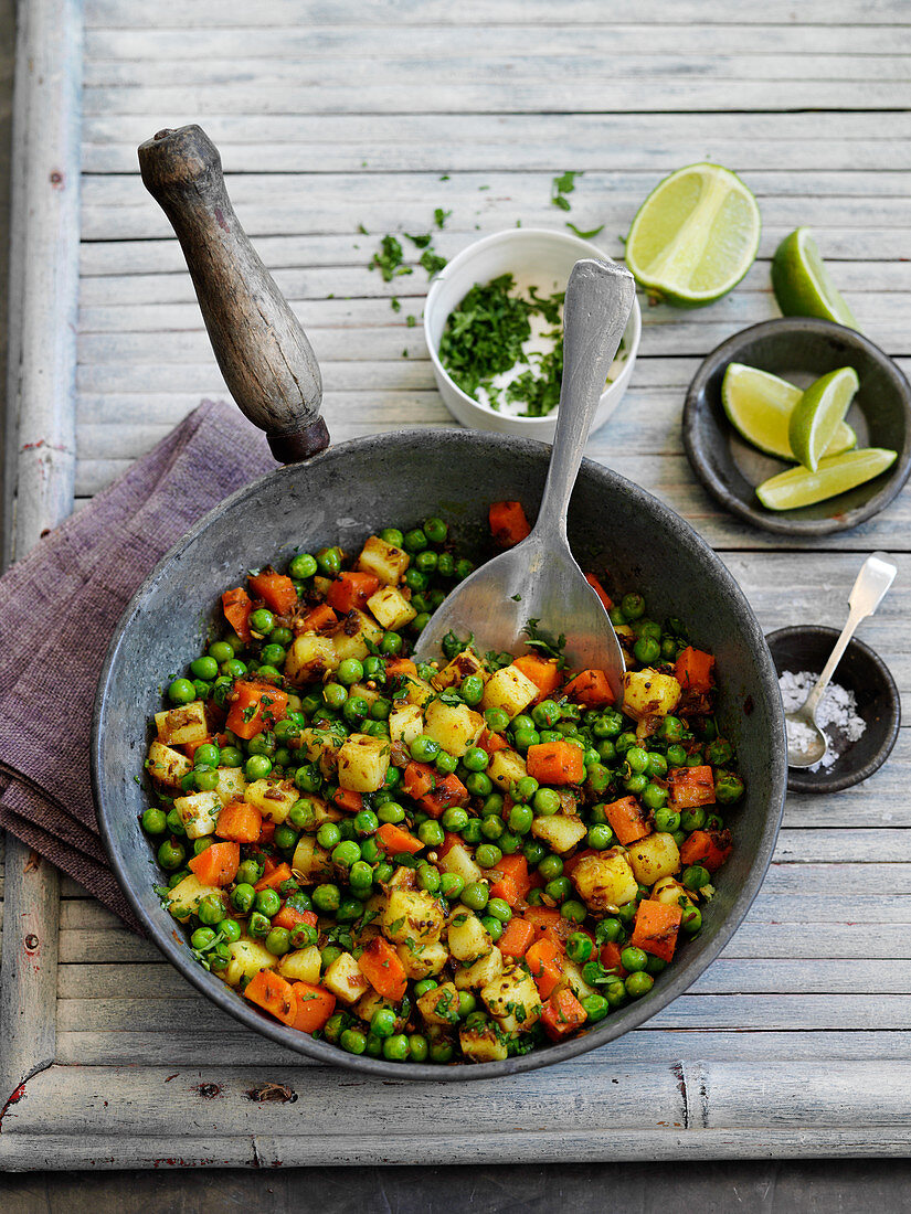 Spicy peas and carrots with herbs and lime