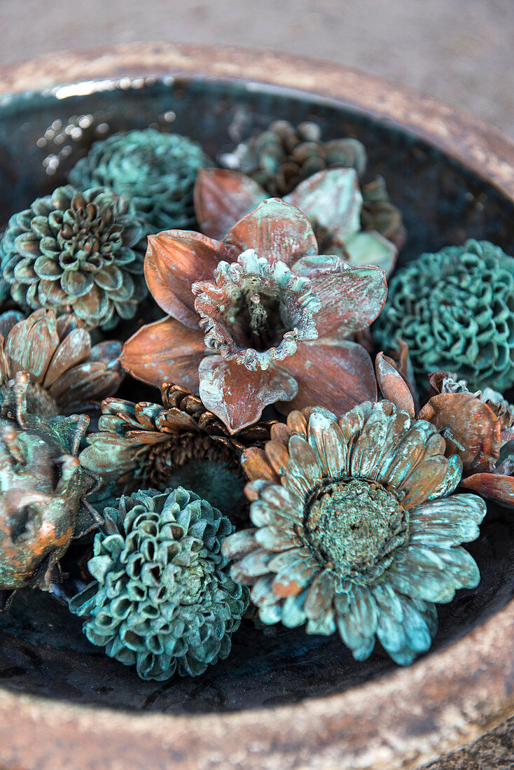 Flower arrangement in shades of copper and verdigris