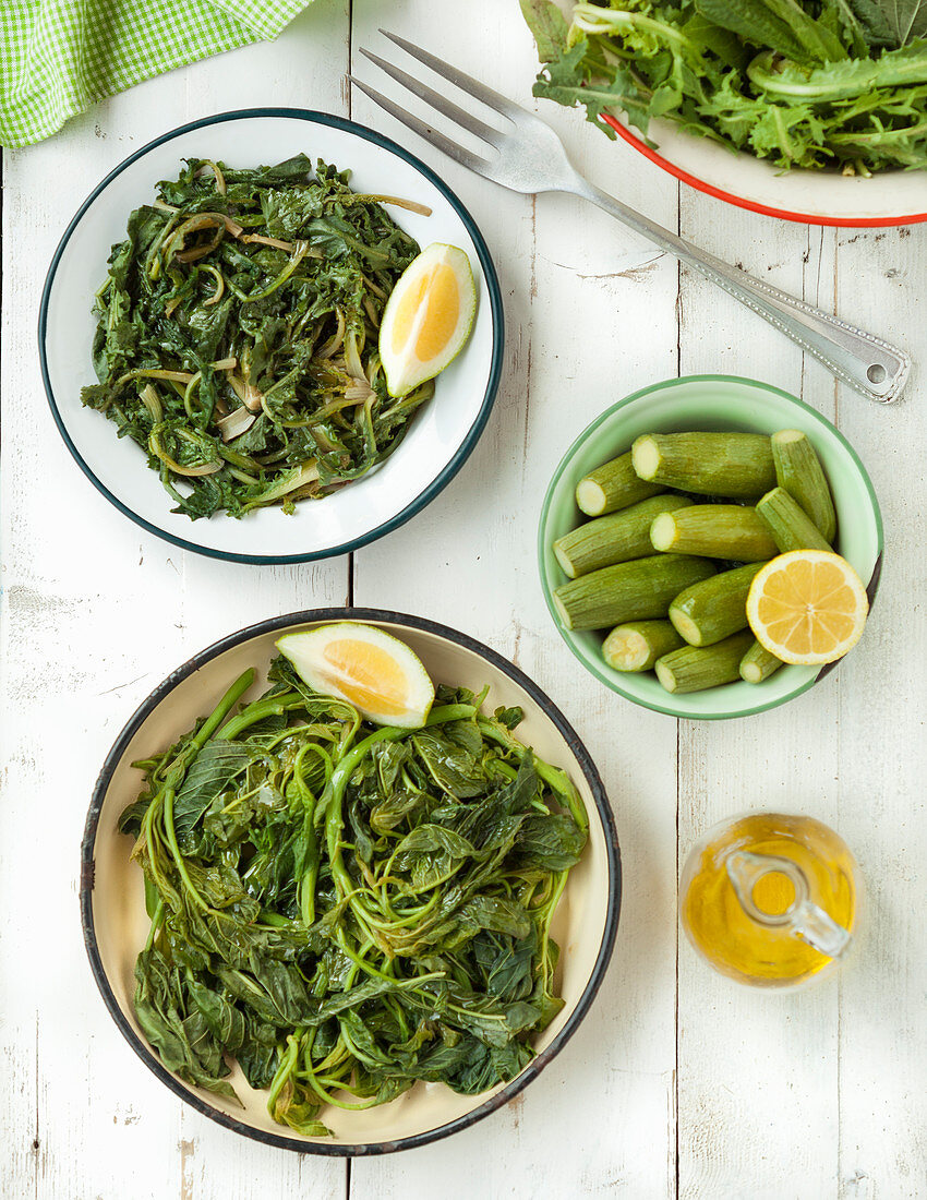 Steamed greens and mini courgette with lemon and olive oil