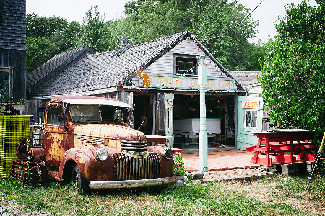 Old rusty truck outside American fishmongers