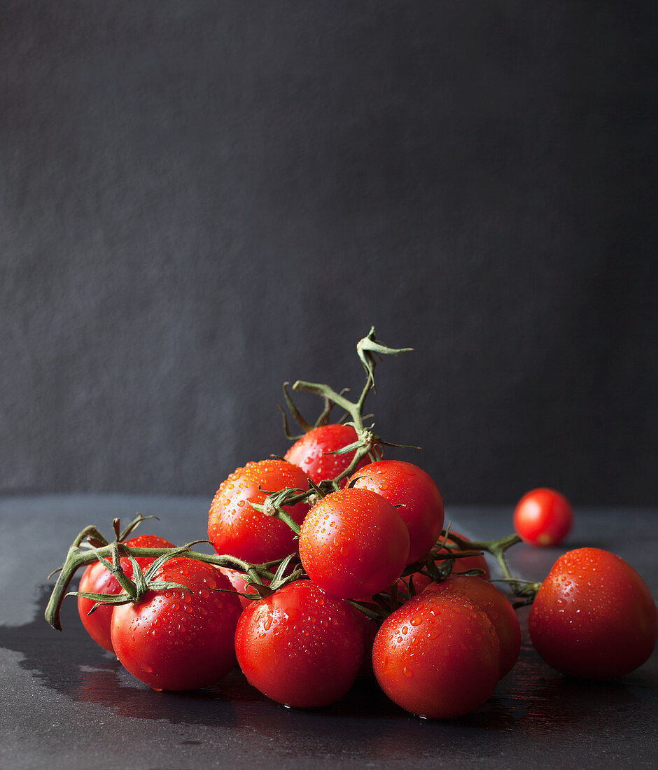 Freshly Washed Vine Ripened Tomatoes in a Pile