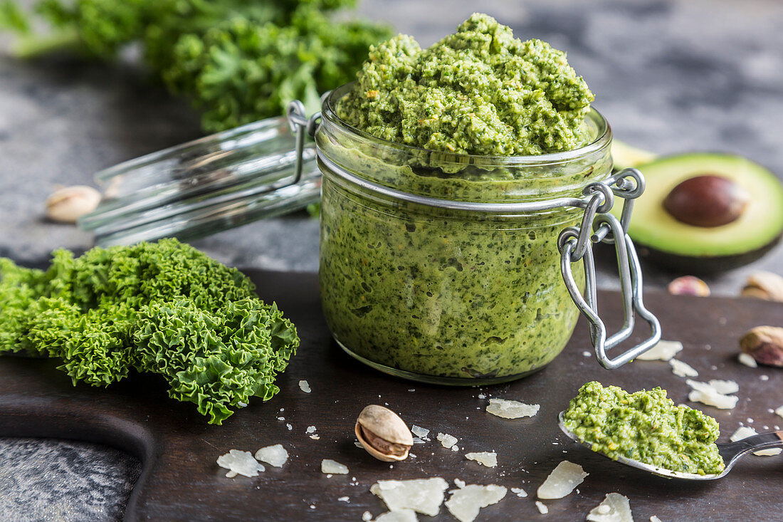 A jar of green kale pesto