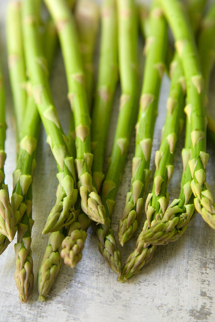 Green asparagus on white background