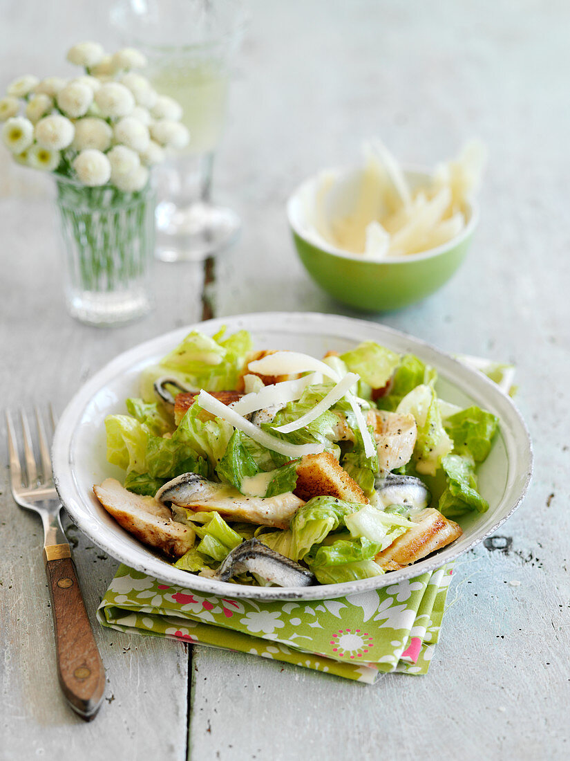Caesar salad with chicken and croutons