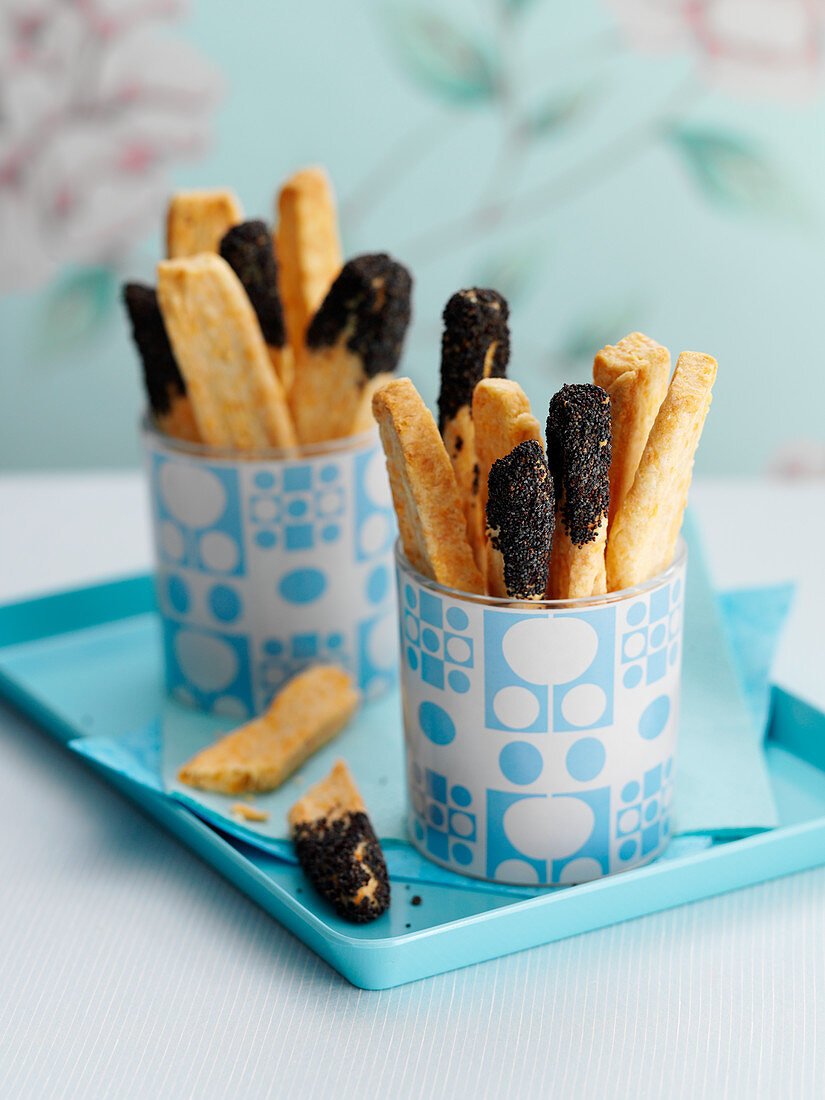 Cheese sticks with poppy seeds