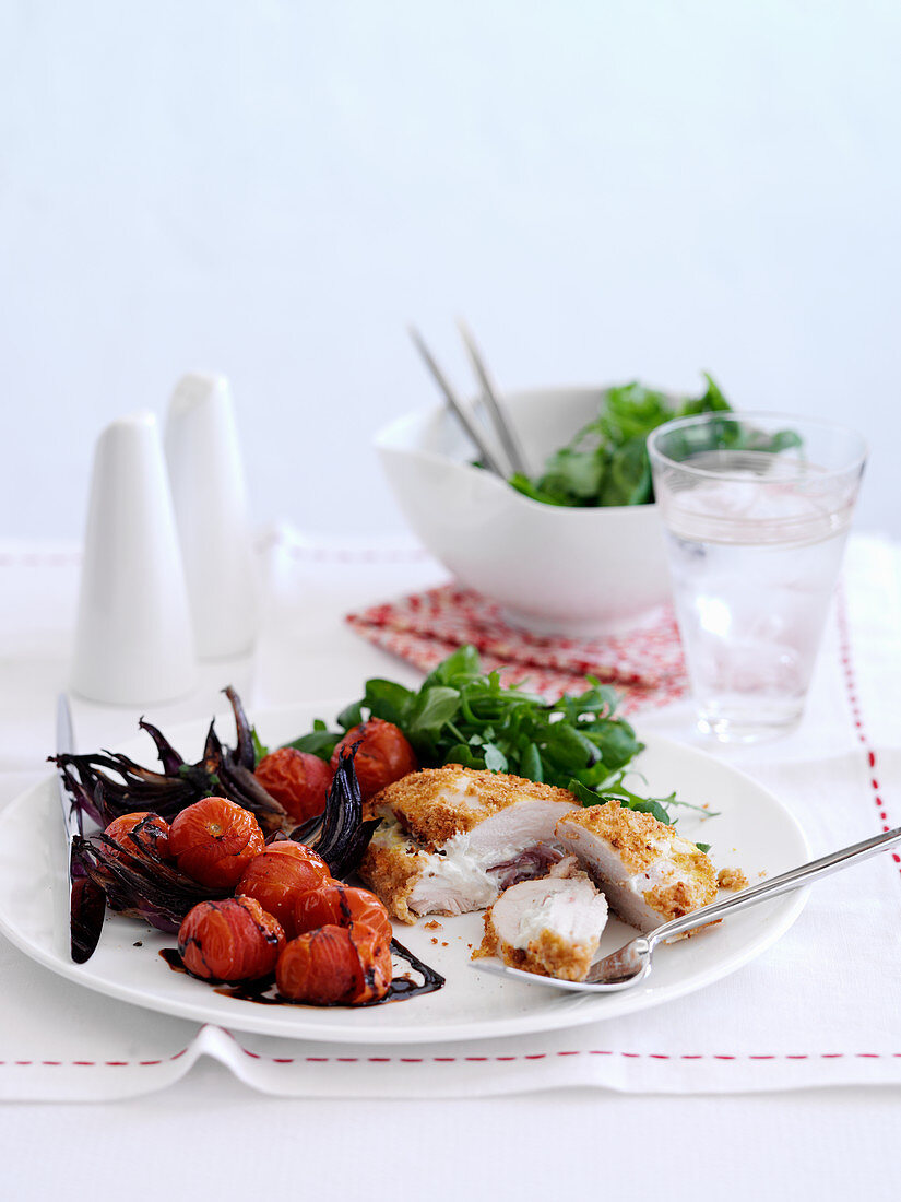 Chicken Cordon Bleu with roasted cherry tomatoes