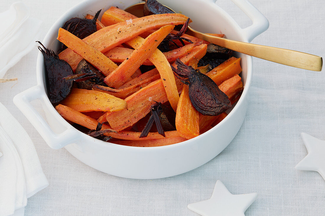 Roasted carrot sticks with beetroot for Christmas dinner