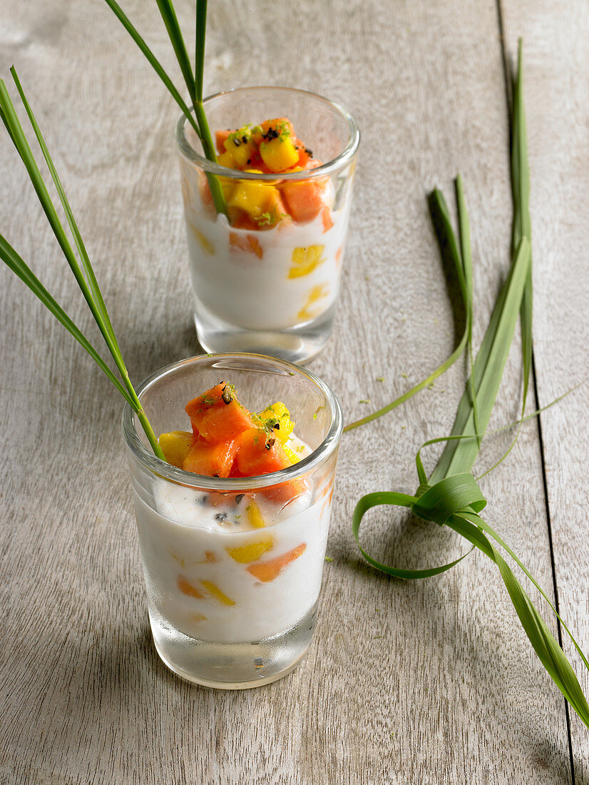 Chilled coconut milk with lemongrass, papaya, mango and lime zest