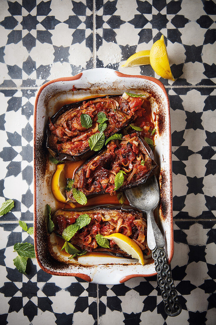 Tomato and date stuffed brinjals