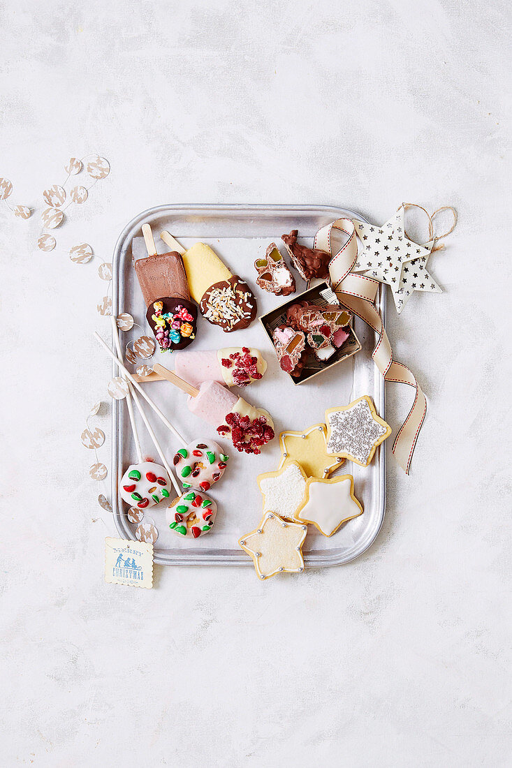 Dipped paddle pops, mini doughnut wreath pop, sparkly christmas stars, chocolate crackle rocky road
