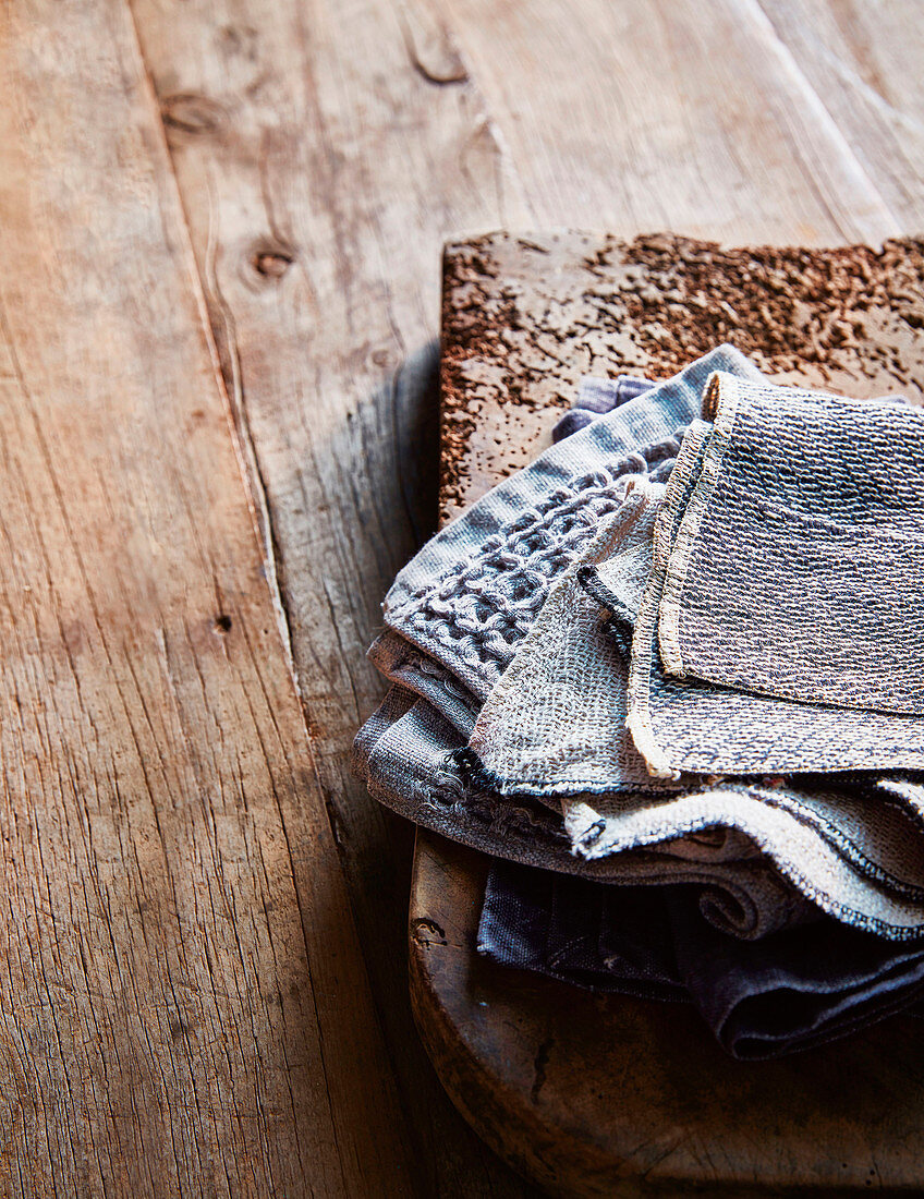 Kitchen rags on a wooden board