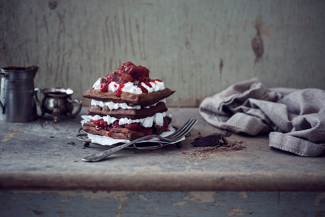 Waffles with soy buttercream and Black Forest style cherries (vegan)