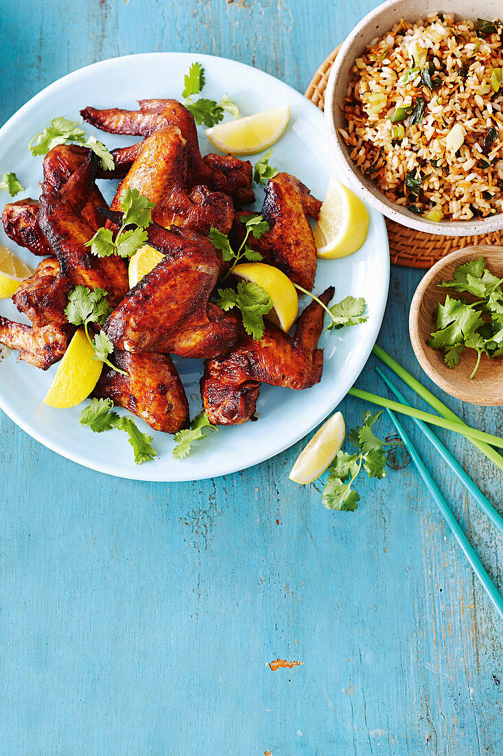 Sticky chicken wings with caramelised onion and coconut rice