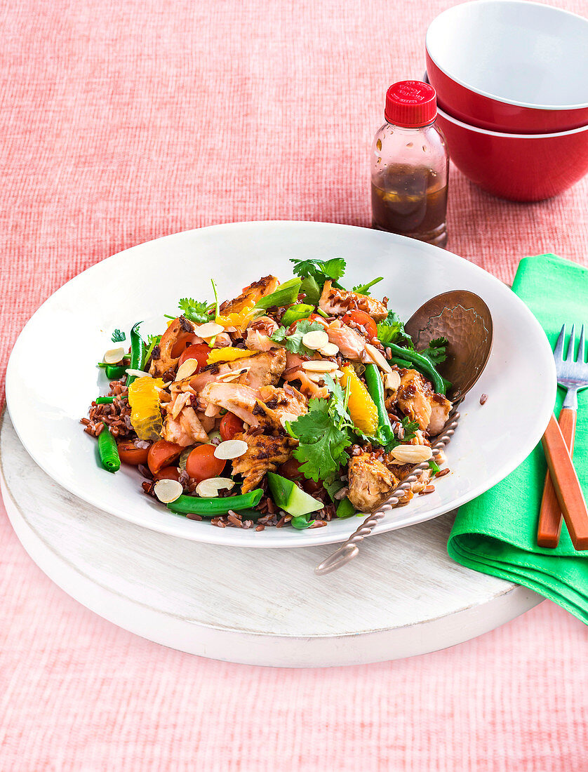Red rice salad with grilled soy-ginger salmon and vegetables
