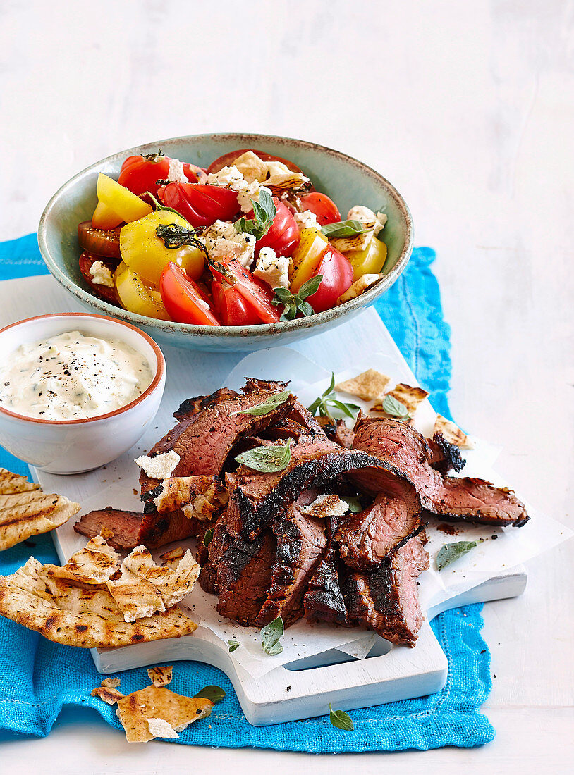 Skirt steak with tomato and feta salad