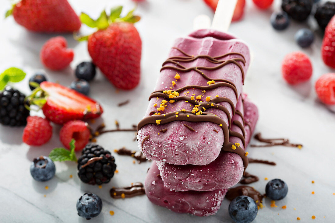 Home-made berry ice lollies