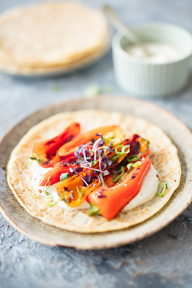 Vegan pancakes with grilled peppers and cashew cream cheese