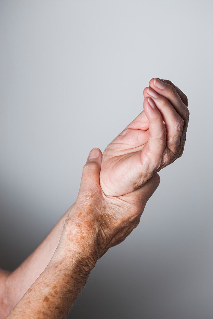 Elderly woman with wrist pain