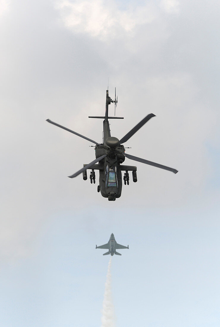 Apache helicopter and F-16 fighter