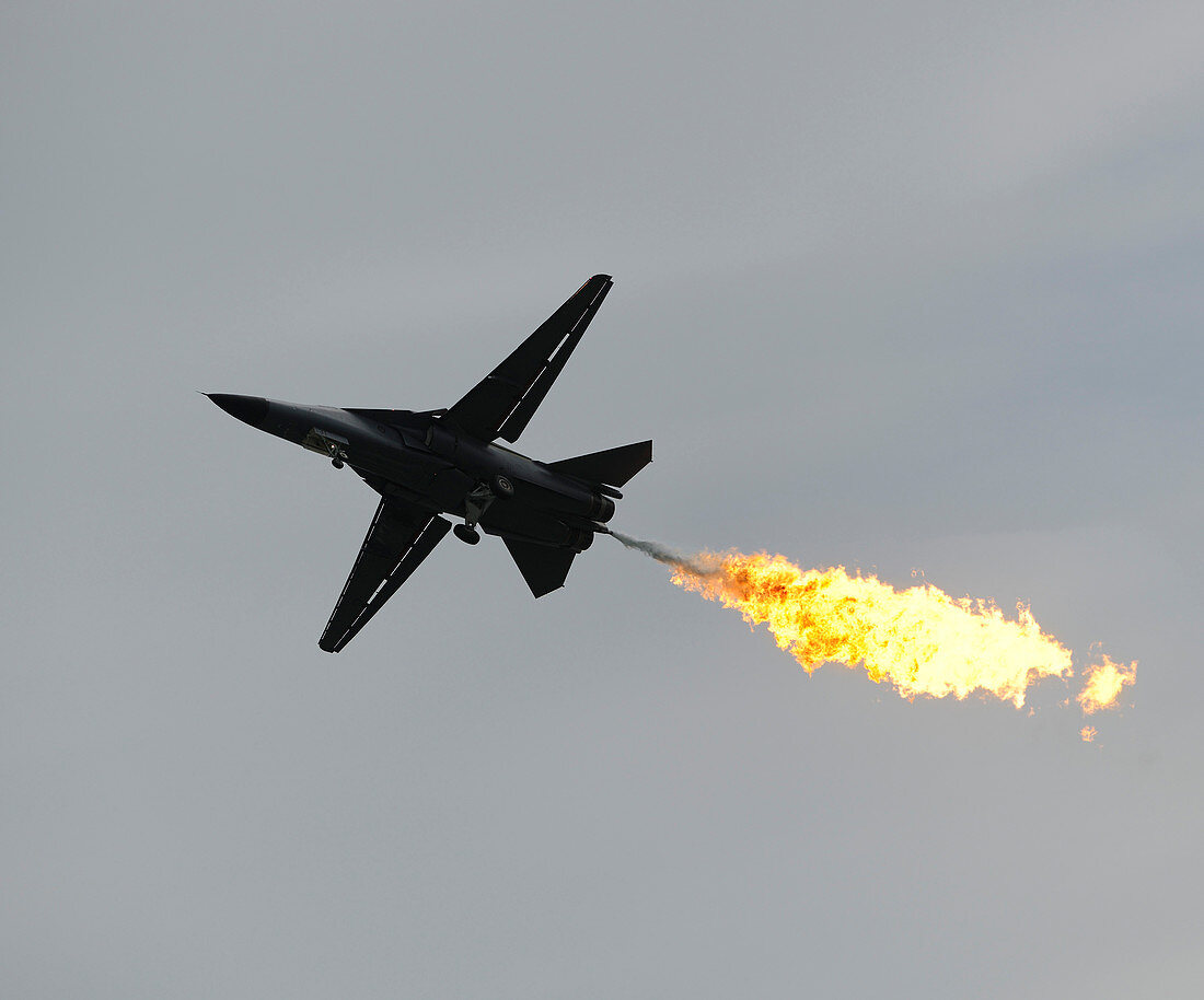 F-111 Aardvark aircraft performing a dump-and-burn