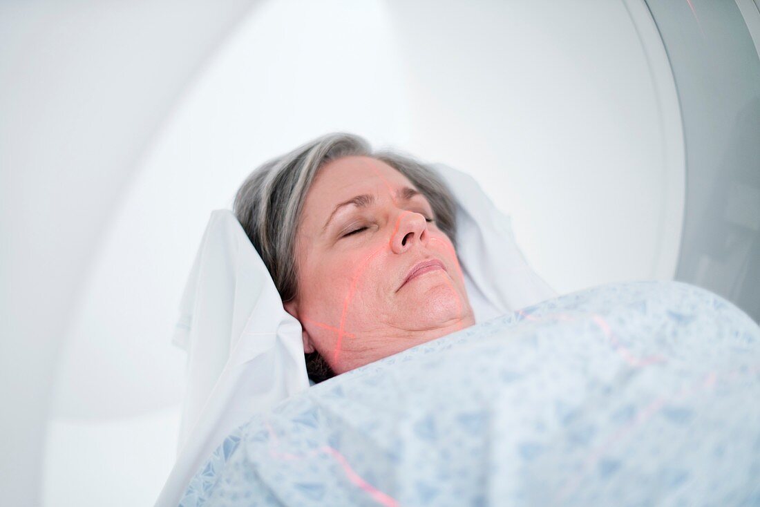 Female patient in MRI scanner