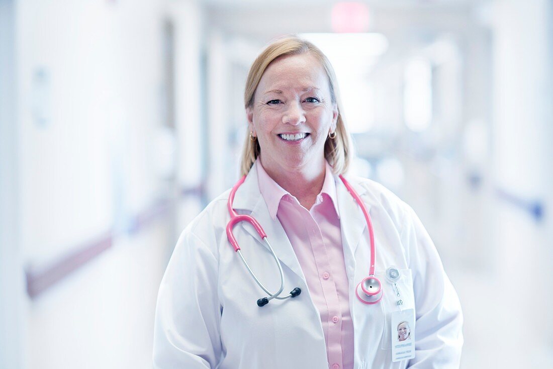 Mature nurse smiling