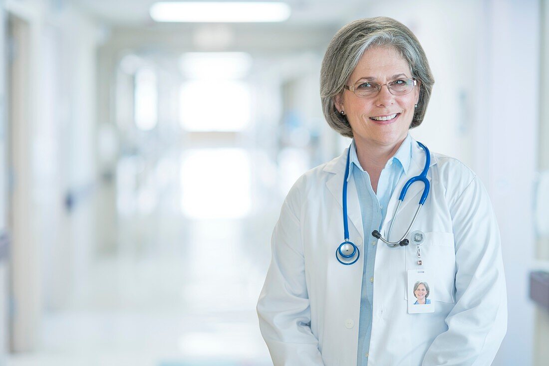 Mature female doctor smiling