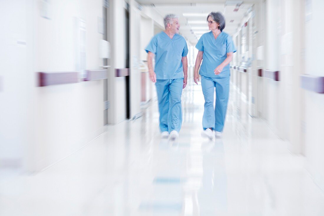 Two doctors wearing surgical scrubs