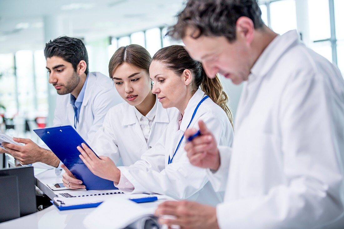 Medical colleagues with clip board