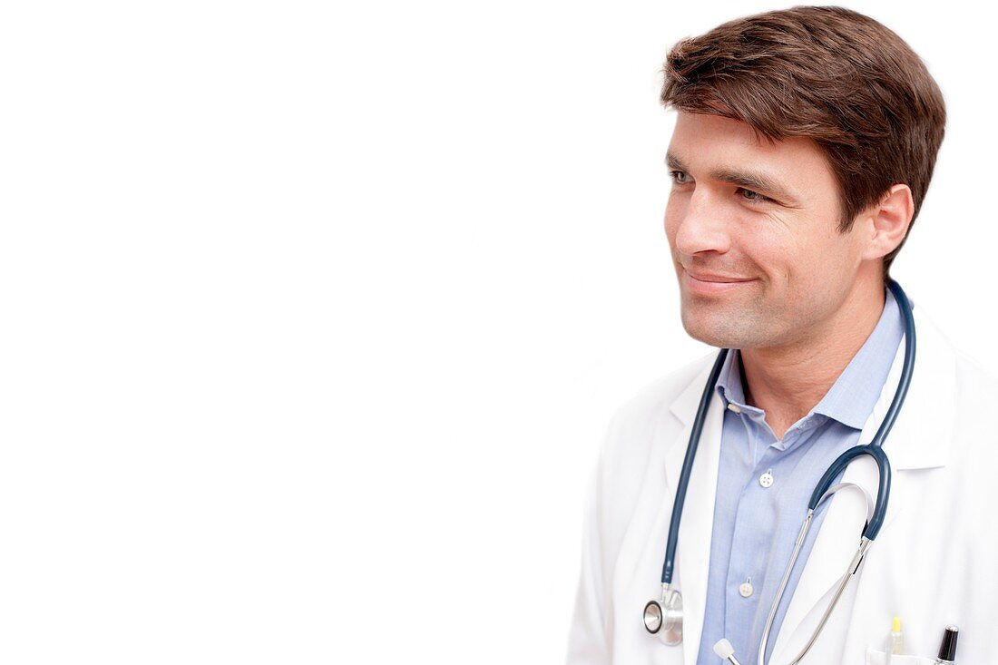 Doctor against white background looking away smiling