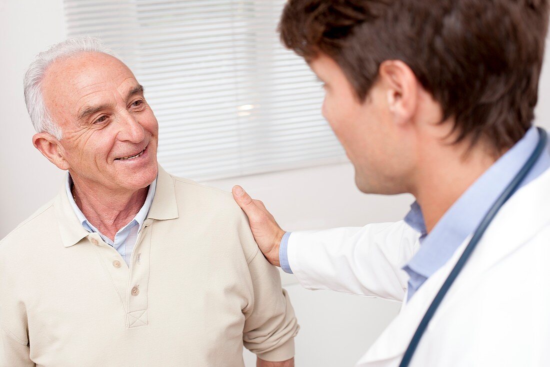 Doctor with senior male patient