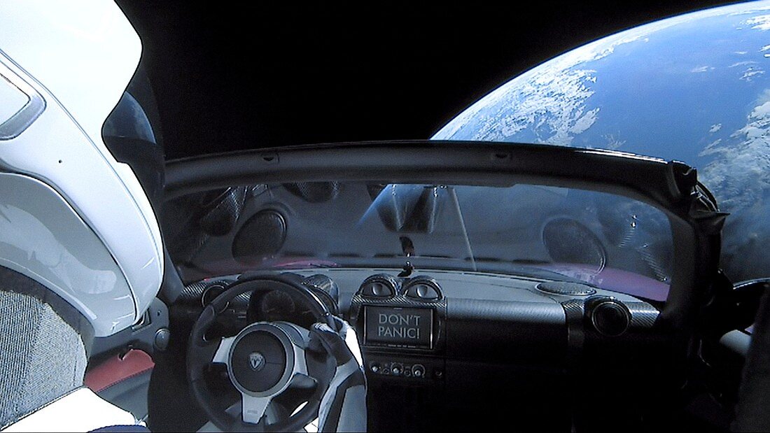 Tesla Roadster and mannequin in space