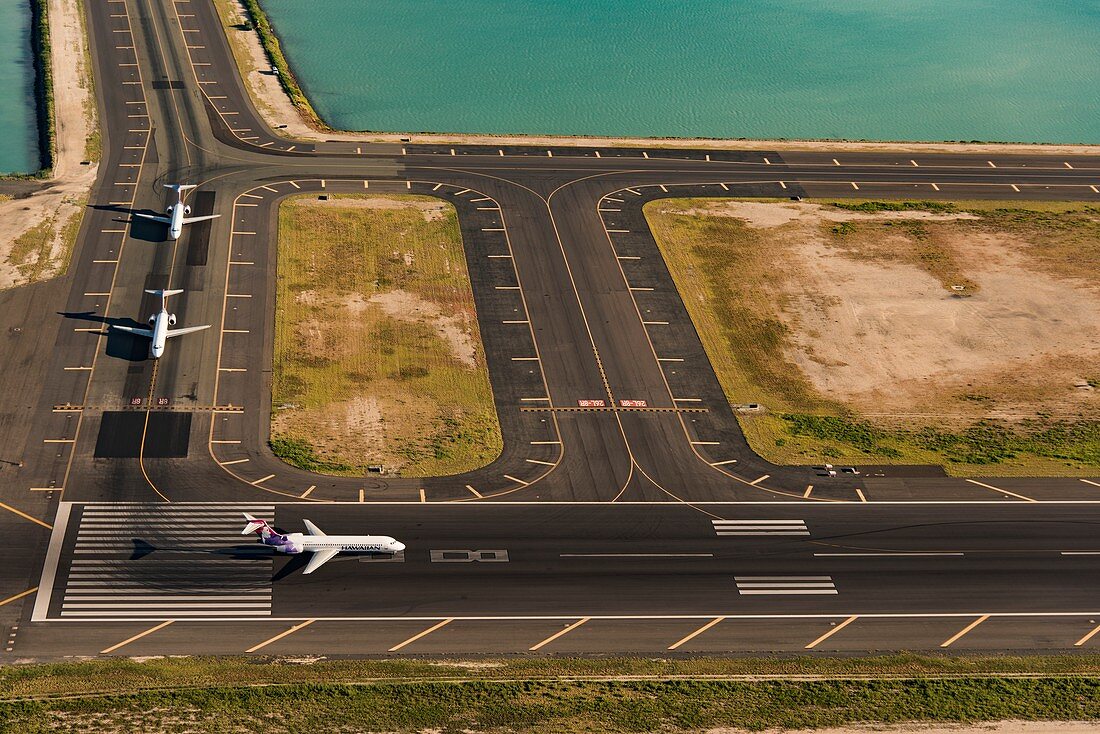 Planes on runway, Honolulu, Hawaii, USA, aerial photograph