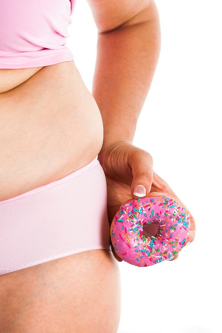 Woman holding doughnut by hips