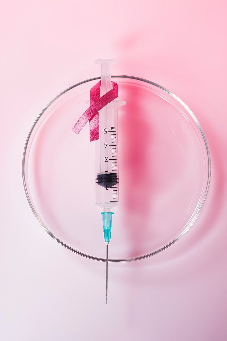 Syringe with breast cancer awareness ribbon