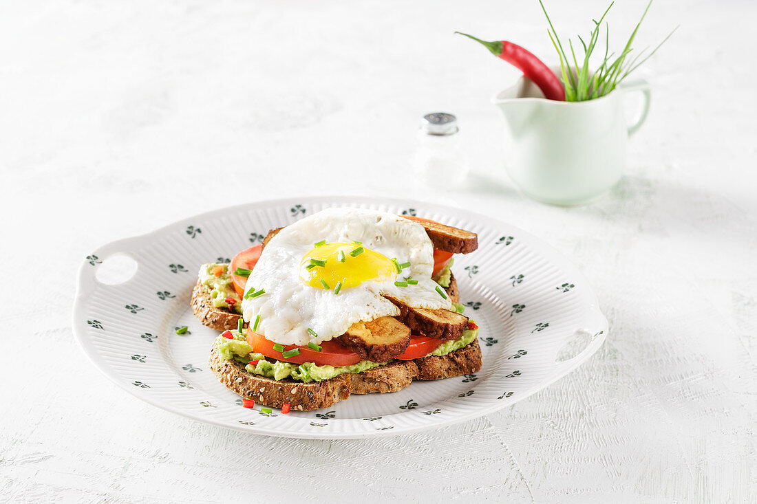 Avocado on toast with a fried egg