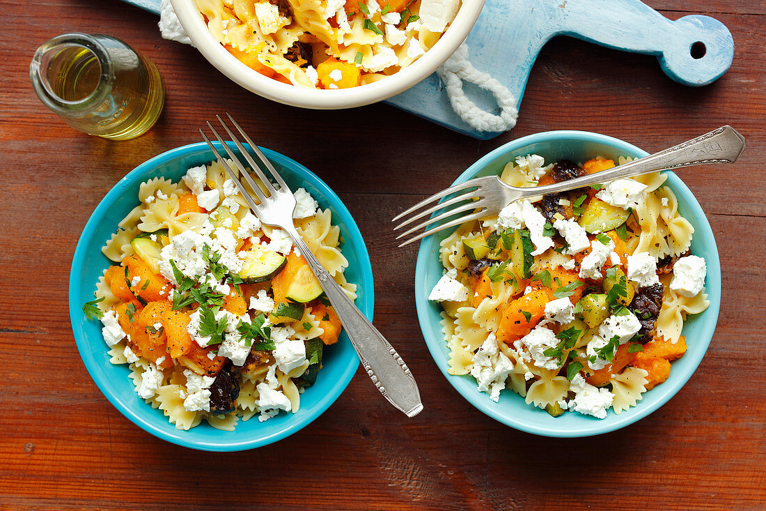Farfalle with pumpkin, courgette, prunes and feta