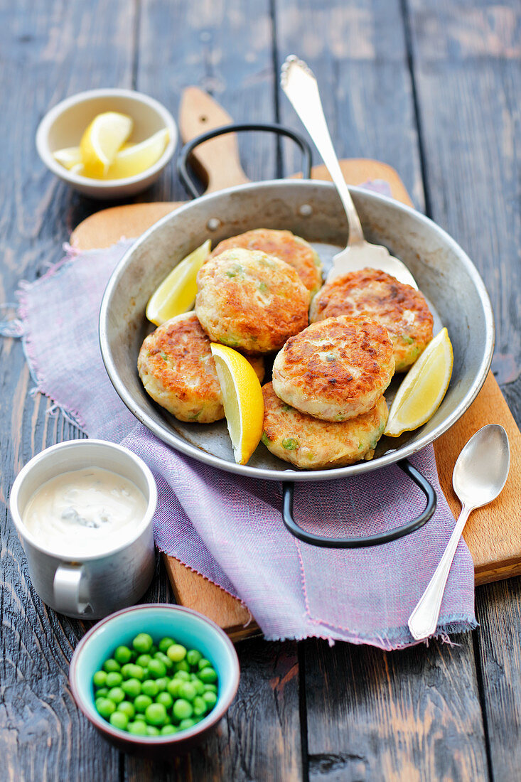 Tuna and potato cakes with green peas