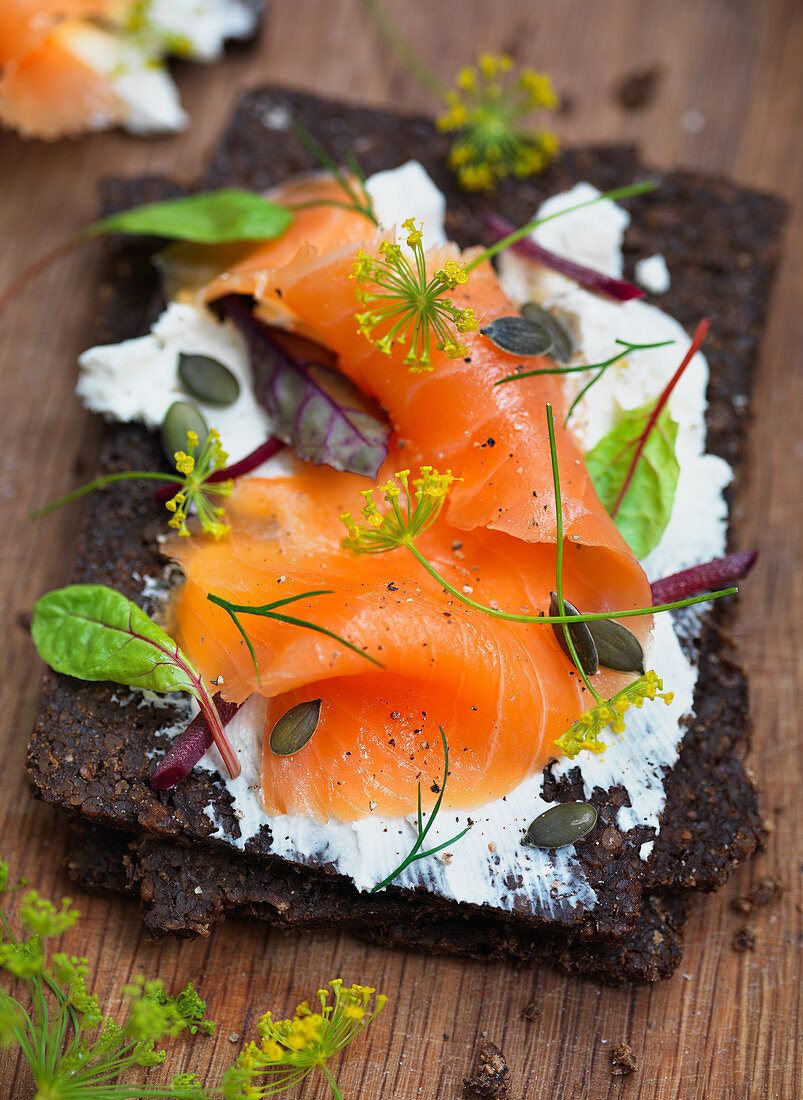 Smoked salmon and cream cheese and herbs on bread