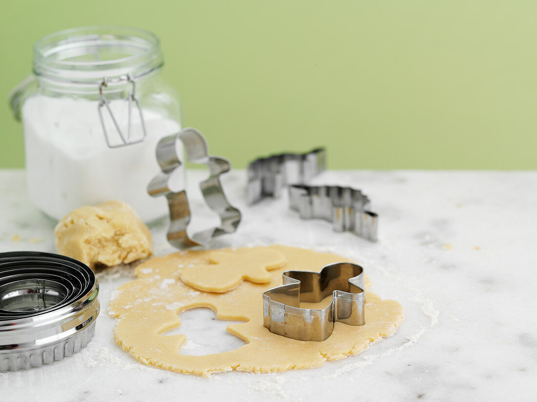 Cookie dough with cookie cutters