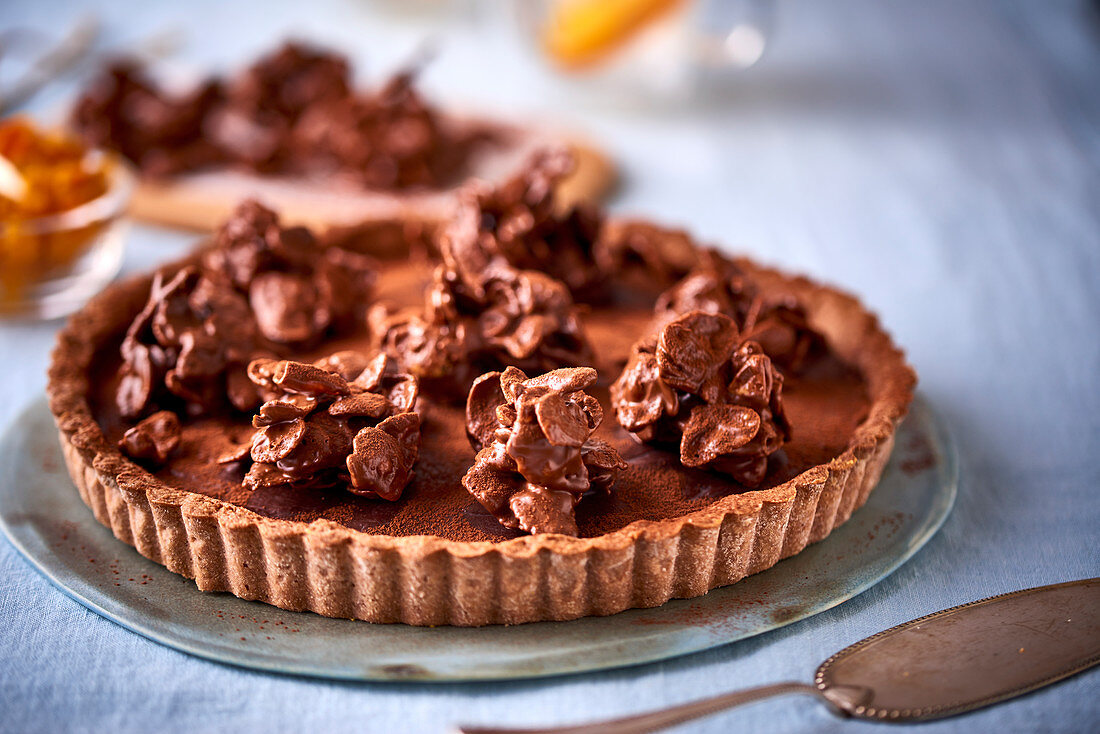 A chocolate and pumpkin tart topped with cornflakes