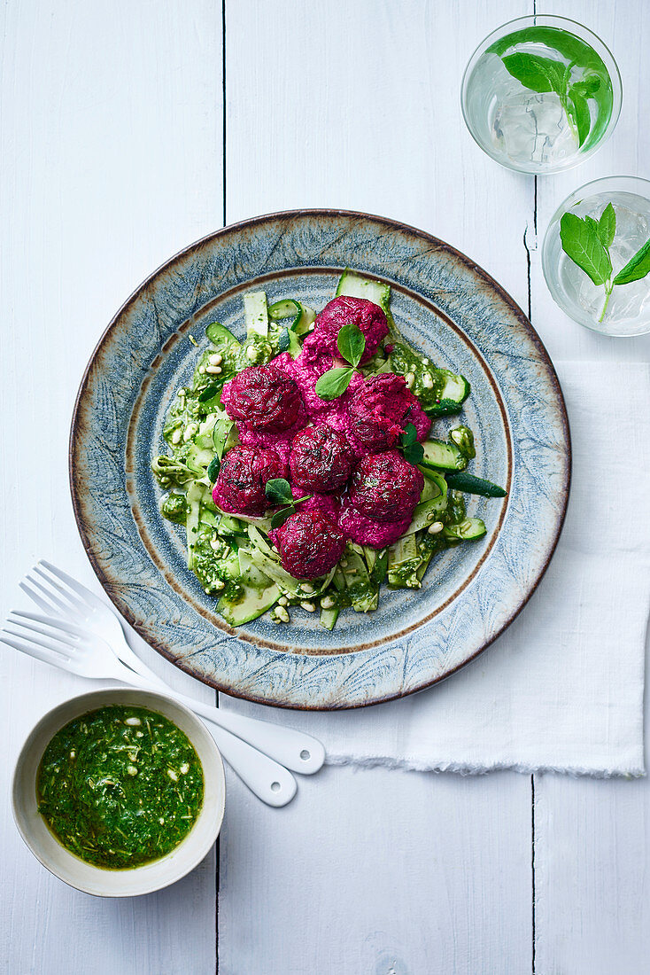Beetballs on courgette ribbons with beetroot pesto