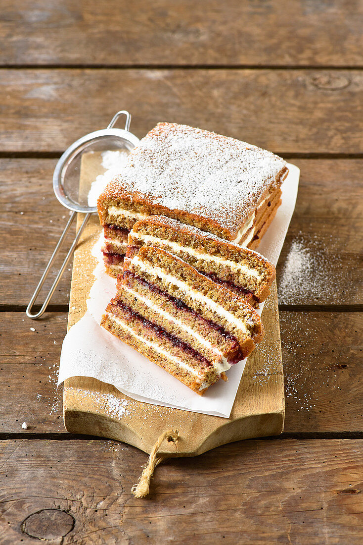 Nut cake with jam and creme fraiche